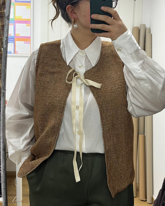 Gilet lana zig zag con fiocco